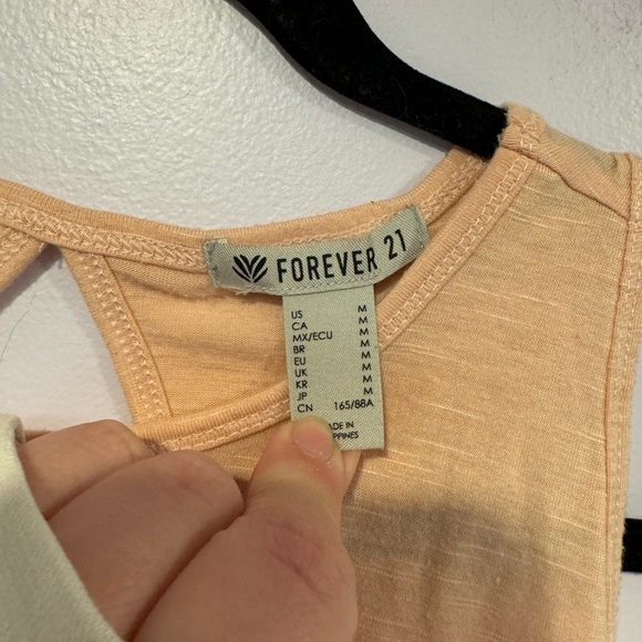 Light pink open twist back forever 21 workout top - Picture 2 of 3